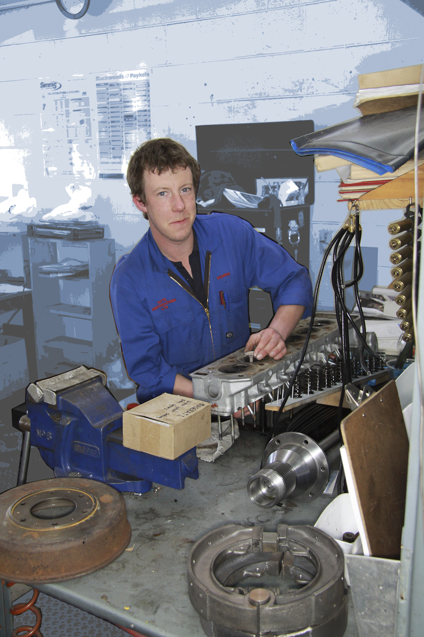 Morris Wright at work on a classic Bugatti head in the Mechanical Shop at Auto Restorations.