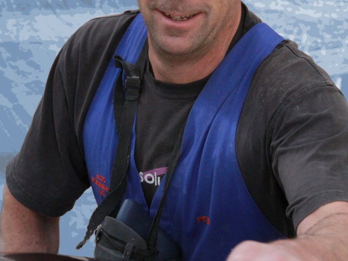 Peter Hendricks putting the finishing touch on the Concours award winning paint job of a completed 1963 Ferrari Lusso 250GT restoration, Paint Shop, Auto Restorations.