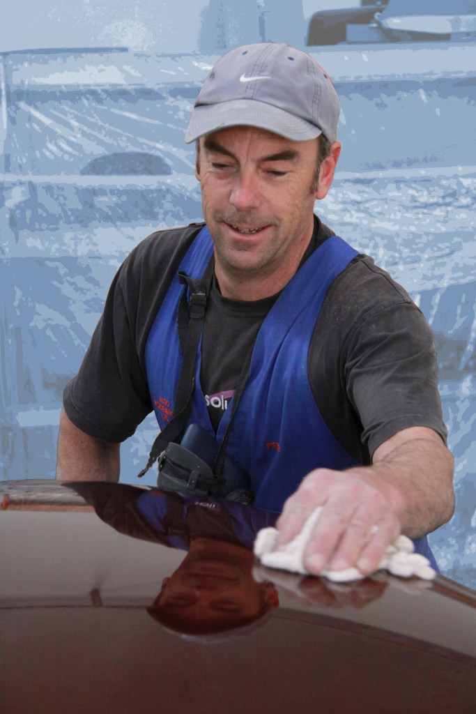 Peter Hendricks putting the finishing touch on the Concours award winning paint job of a complete Ferrari Lusso restoration, Paint Shop, Auto Restorations.