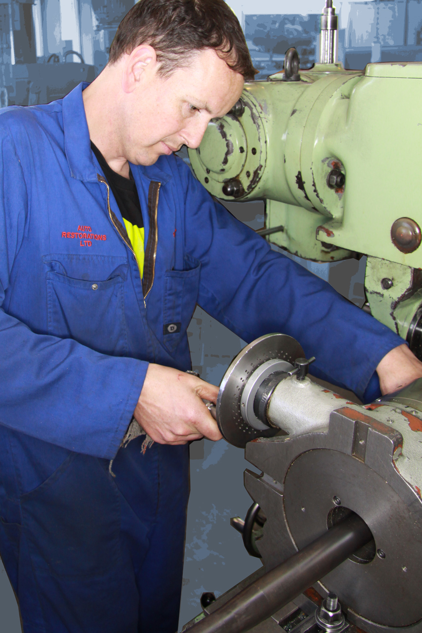 Simon Steffens machining a bespoke part in the Auto Engineering Shop at Auto Restorations.