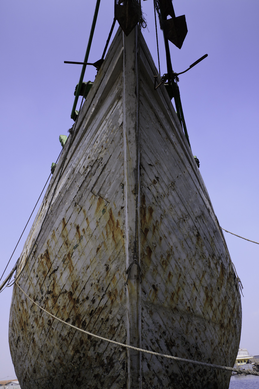 The prow of Bintang Harapan Jaya a magnificent Makassar schooner called Pinisi. Seen on a tour of the Port of Sunda Kelapa, Jakarta, Indonesia.