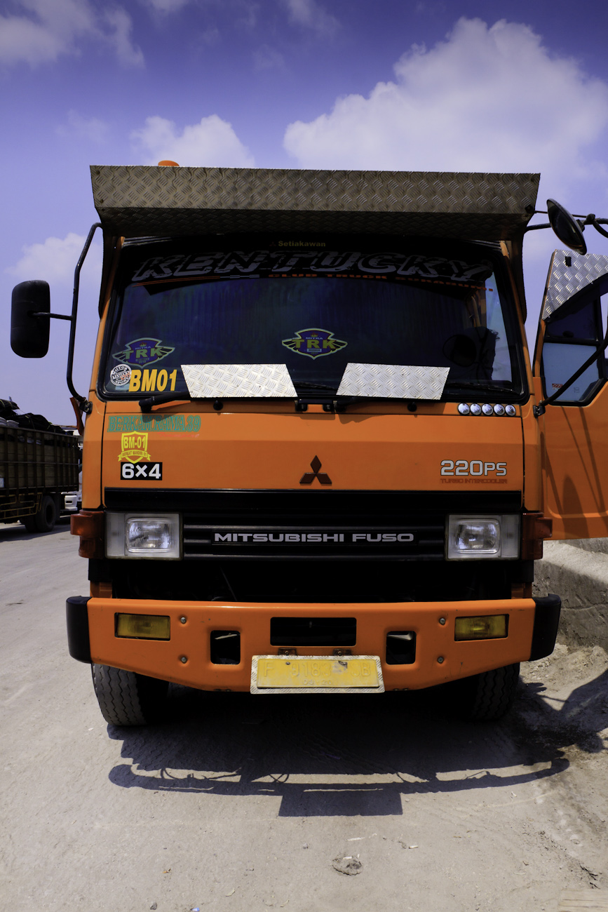 A freight truck lined up on the wharf at the port of Sunda Kelapa.