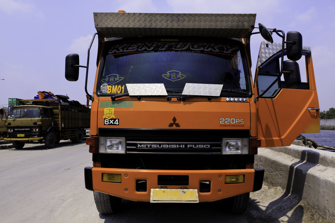 A freight truck lined up on the wharf at the port of Sunda Kelapa.