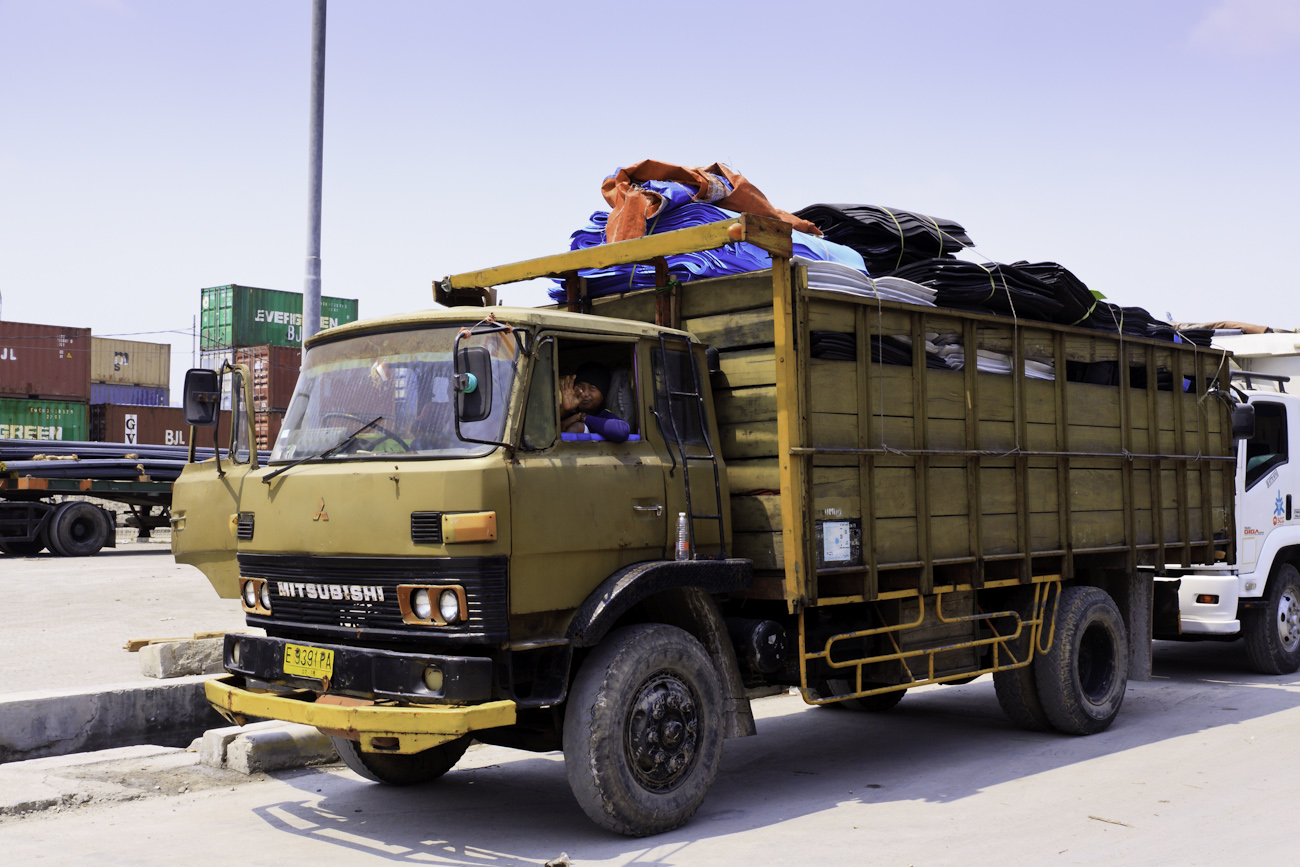 A freight truck lined up on the wharf at the port of Sunda Kelapa.