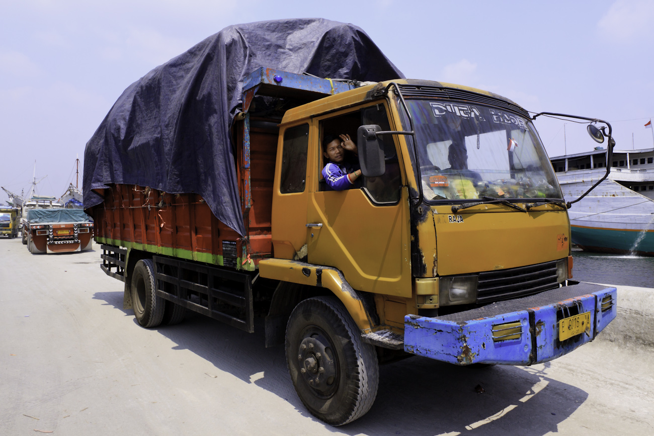 A freight truck lined up on the wharf at the port of Sunda Kelapa.