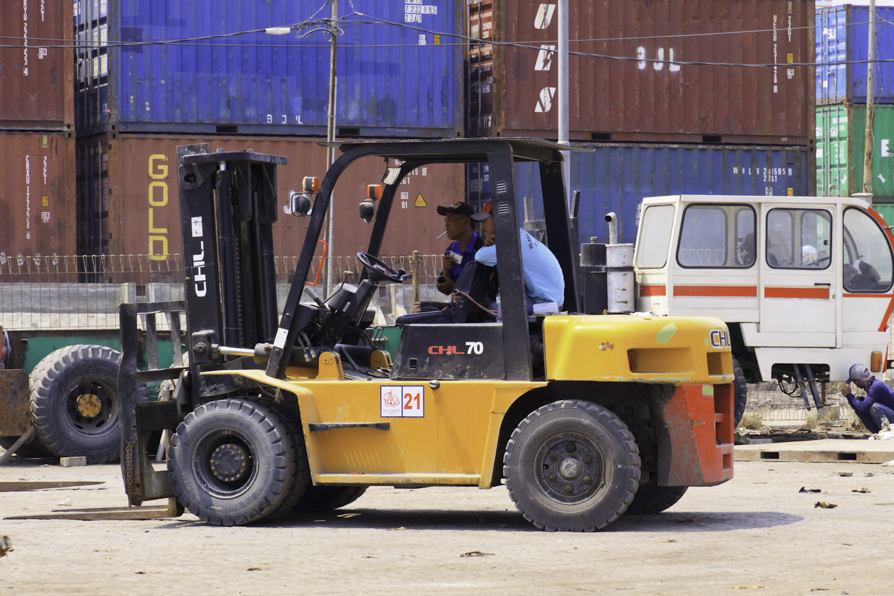 Forklift being operated on the wharf of the Sunda Kelapa old port.