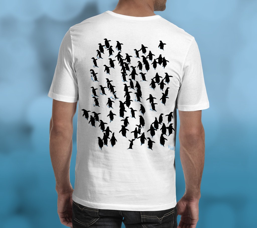 Adelie penguins Antarctica t-shirt back view worn by a man in a studio.