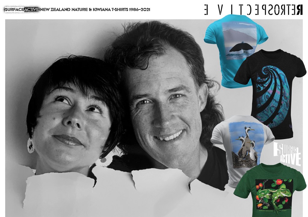 Surface Active Retrospective exhibition poster. New Zealand Nature & Kiwiana t-shirts 1986—2021. A closeup portrait of Chrissie Terpstra and Shaun Waugh. Their heads are bursting through a big sheet of paper. To their right are four Surface Active t-shirt designs on ghosted short sleeve t-shirts.