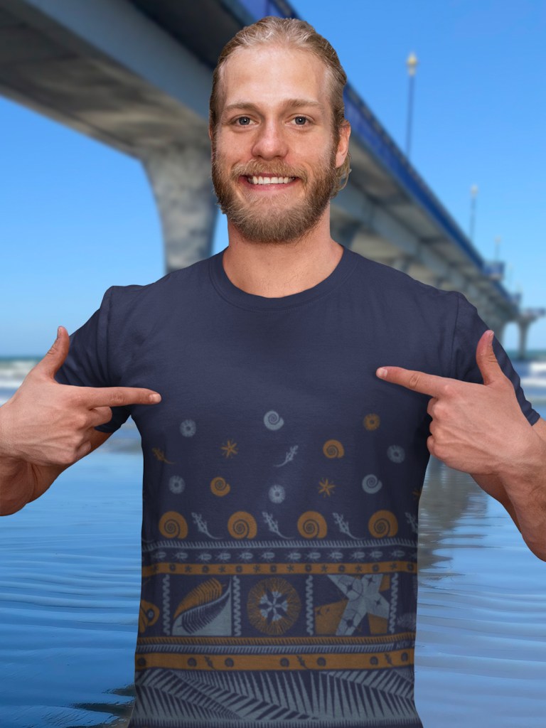 A man showing his navy blue Surface Active tapa all-over printed t-shirt.