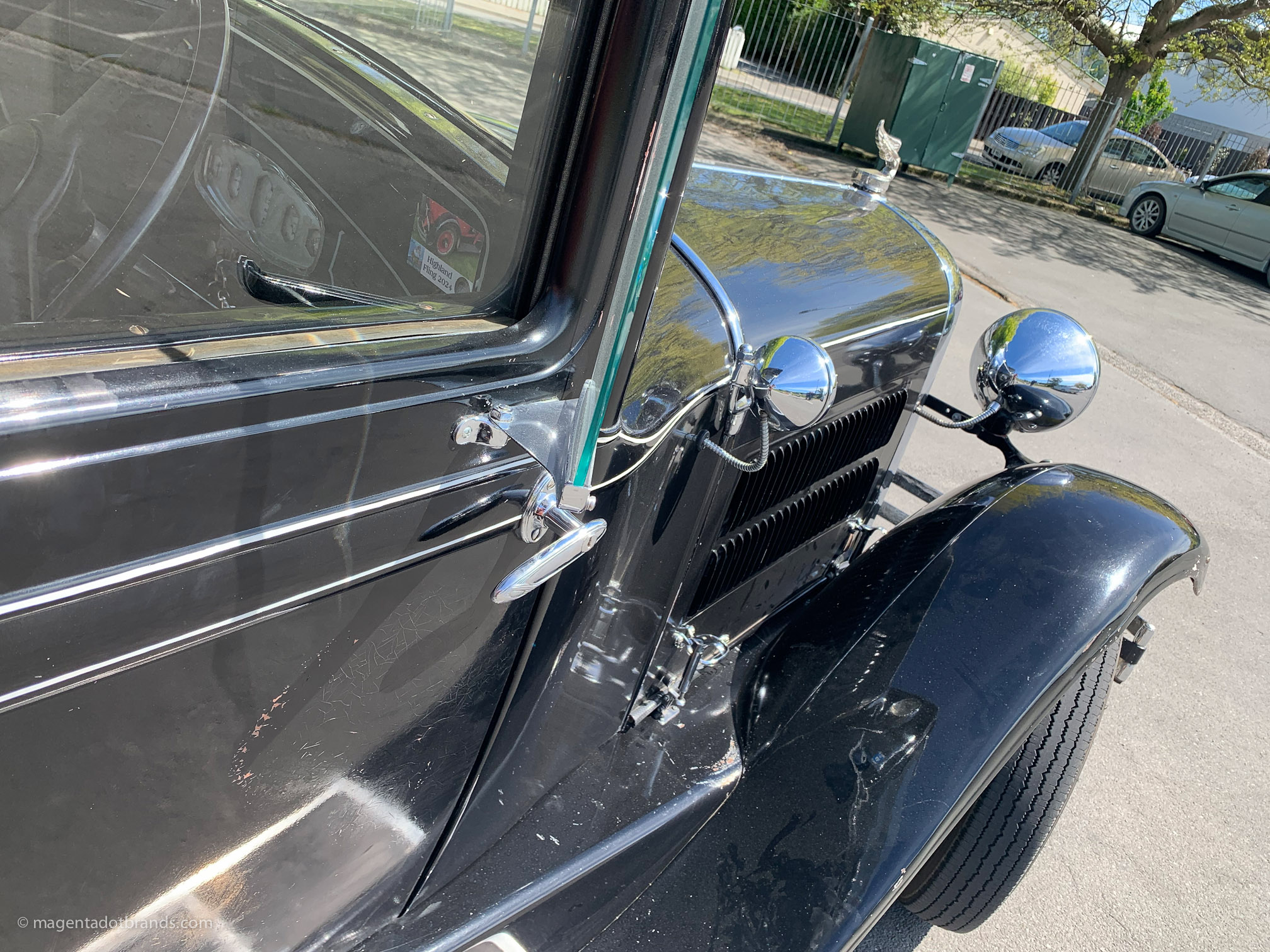 Abstract close-up oblique view, looking down the right hand side of the louvered bonnet of a restored 1928 Essex Super Six