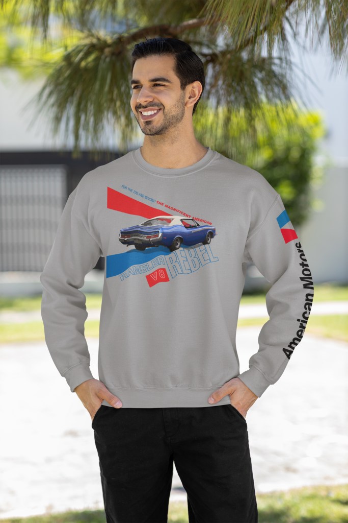 Man in grey marle long-sleeve t-shirt with 1970 Rambler Rebel SST graphic and American Motors logo in a park.